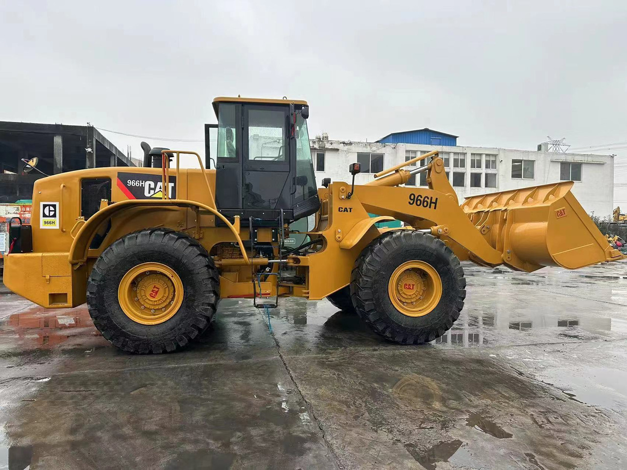 CATERPILLAR 966H - Bager na kolesih: slika 1 CATERPILLAR 966H - Bager na kolesih: slika 1