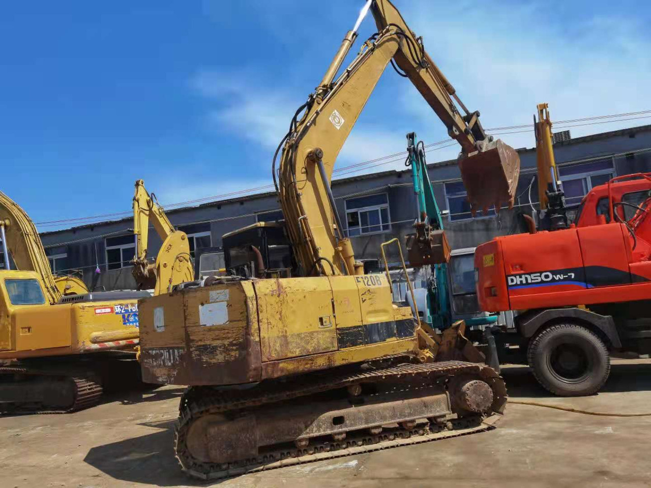 CATERPILLAR E120B - Bager: slika 1 CATERPILLAR E120B - Bager: slika 1