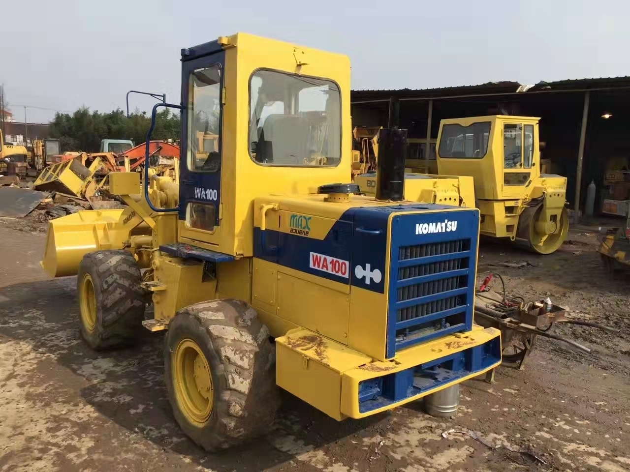 KOMATSU WA100 - Kolesni nakladalec: slika 1 KOMATSU WA100 - Kolesni nakladalec: slika 1