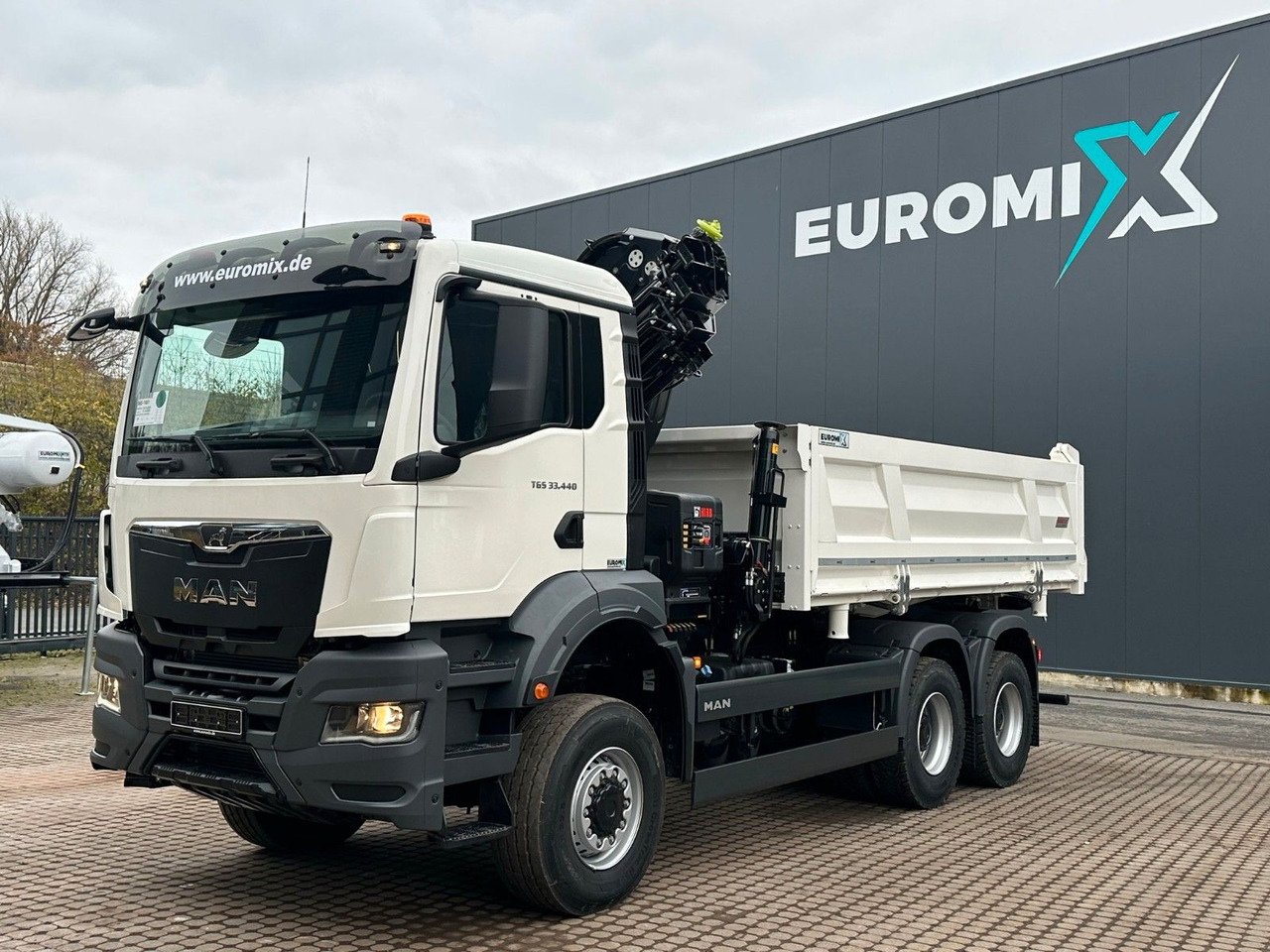 MAN TGS 33.440 6x6 /3-Seiten- Kipper / Kran HIAB 302 - Tovornjak prekucnik, Tovornjak z dvigalom: slika 1 MAN TGS 33.440 6x6 /3-Seiten- Kipper / Kran HIAB 302 - Tovornjak prekucnik, Tovornjak z dvigalom: slika 1