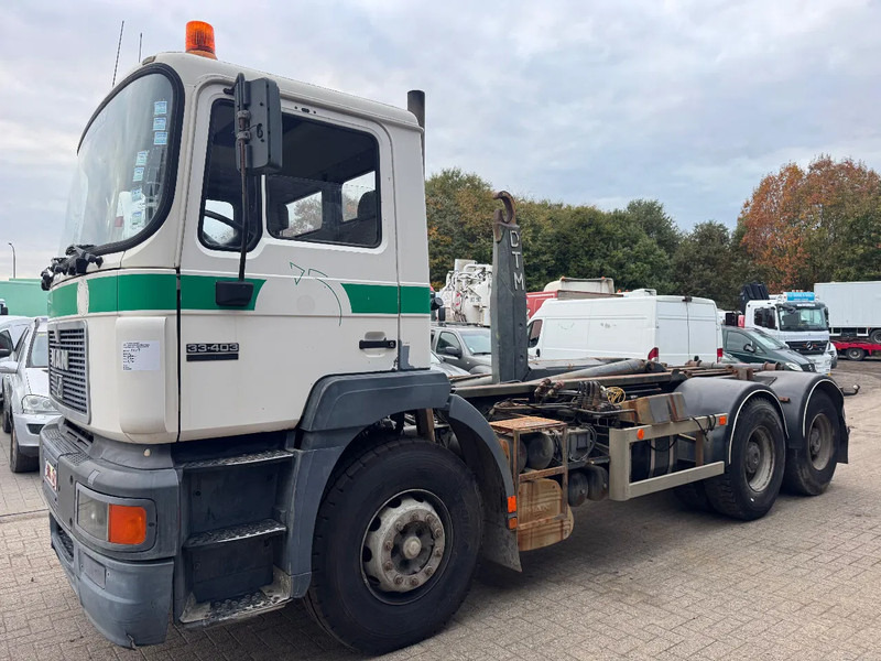 MAN 33.403 **BELGIAN TRUCK-FULL STEEL-MANUAL PUMP** - Kotalni prekucni tovornjak: slika 1 MAN 33.403 **BELGIAN TRUCK-FULL STEEL-MANUAL PUMP** - Kotalni prekucni tovornjak: slika 1