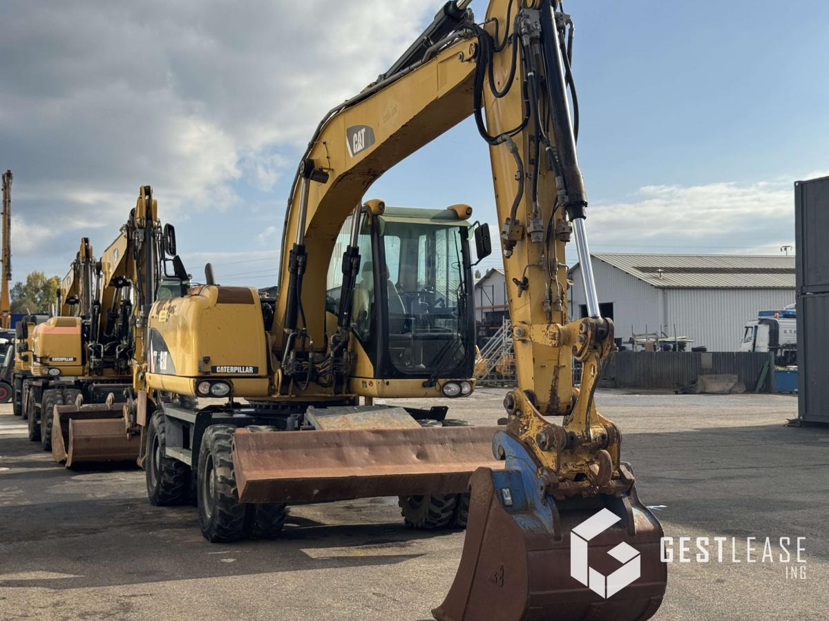 Caterpillar M313D - Bager na kolesih: slika 4 Caterpillar M313D - Bager na kolesih: slika 4