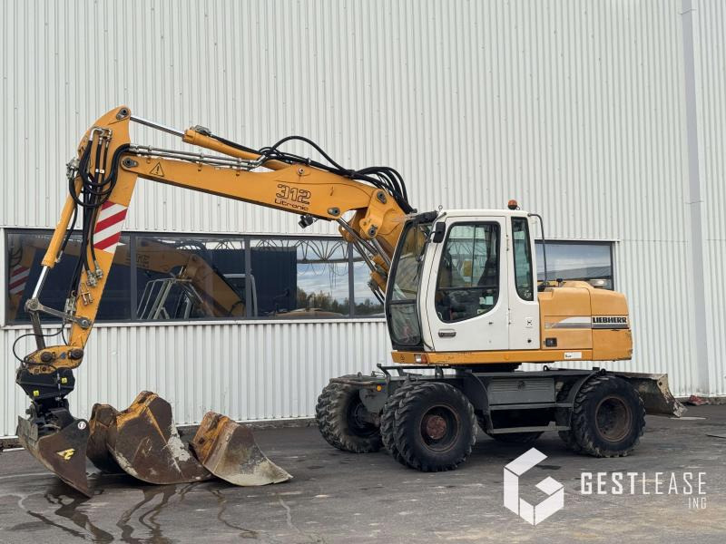 Liebherr A312 Litronic - Bager na kolesih: slika 1 Liebherr A312 Litronic - Bager na kolesih: slika 1