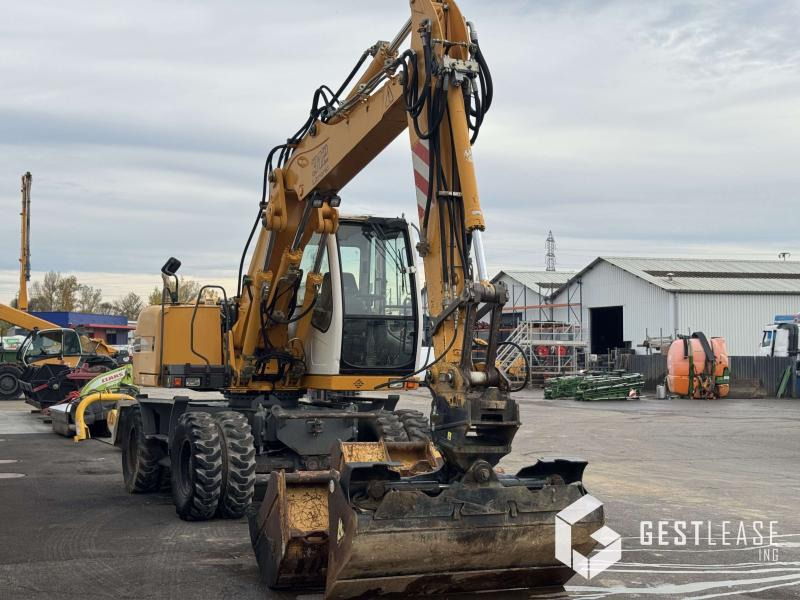 Liebherr A312 Litronic - Bager na kolesih: slika 4 Liebherr A312 Litronic - Bager na kolesih: slika 4