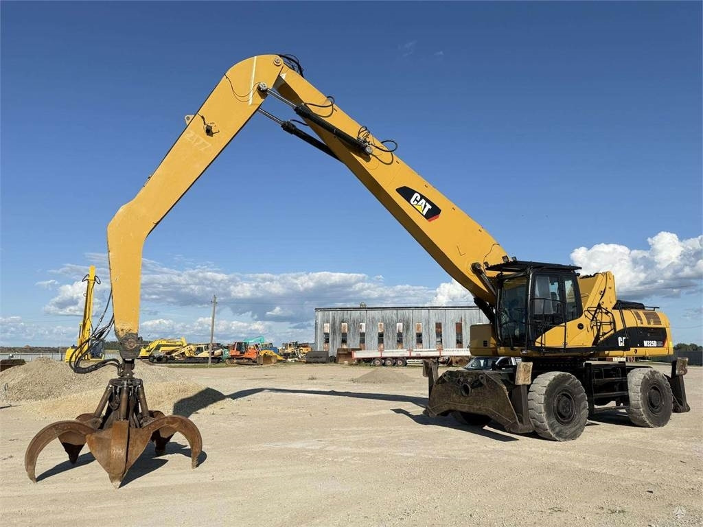 CAT M 325 DLMH - Bager na kolesih: slika 1 CAT M 325 DLMH - Bager na kolesih: slika 1