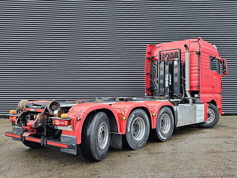 MAN TGX 35.500 / 8x4-4 / HOOKLIFT / ABROLL-KIPPER - Kotalni prekucni tovornjak: slika 3 MAN TGX 35.500 / 8x4-4 / HOOKLIFT / ABROLL-KIPPER - Kotalni prekucni tovornjak: slika 3