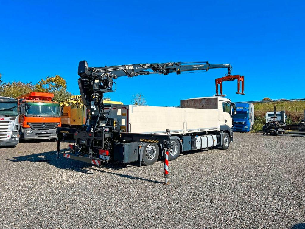 MAN 26.480 6X2 Baustoff mit Kran HIAB Top Zustand - Tovornjak z dvigalom, Tovornjak s kesonom: slika 1 MAN 26.480 6X2 Baustoff mit Kran HIAB Top Zustand - Tovornjak z dvigalom, Tovornjak s kesonom: slika 1