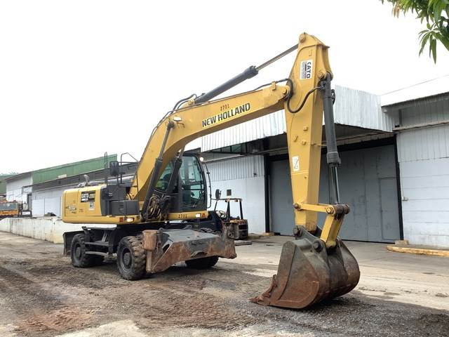 New Holland WE210 - Bager na kolesih: slika 4 New Holland WE210 - Bager na kolesih: slika 4