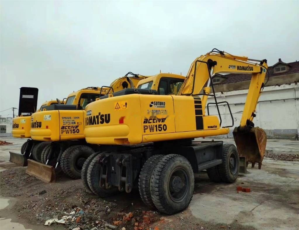 Komatsu PW150 - Bager na kolesih: slika 1 Komatsu PW150 - Bager na kolesih: slika 1