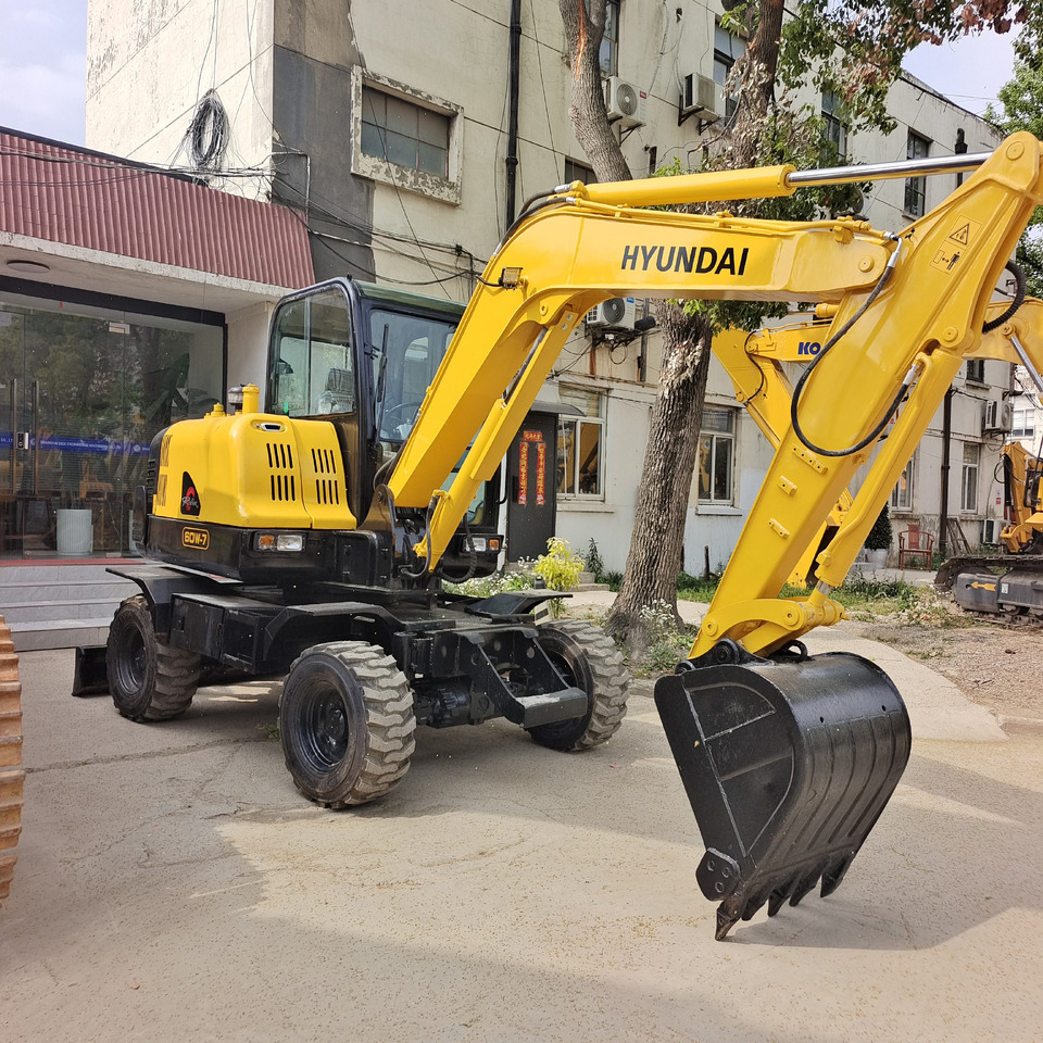 HYUNDAI 60W-7 - Bager na kolesih: slika 1 HYUNDAI 60W-7 - Bager na kolesih: slika 1