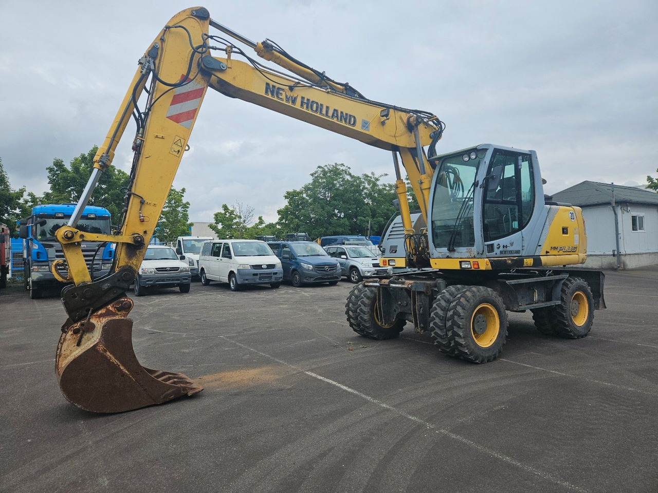 New Holland MH Plus 18t Mobilbagger - Bager na kolesih: slika 1 New Holland MH Plus 18t Mobilbagger - Bager na kolesih: slika 1