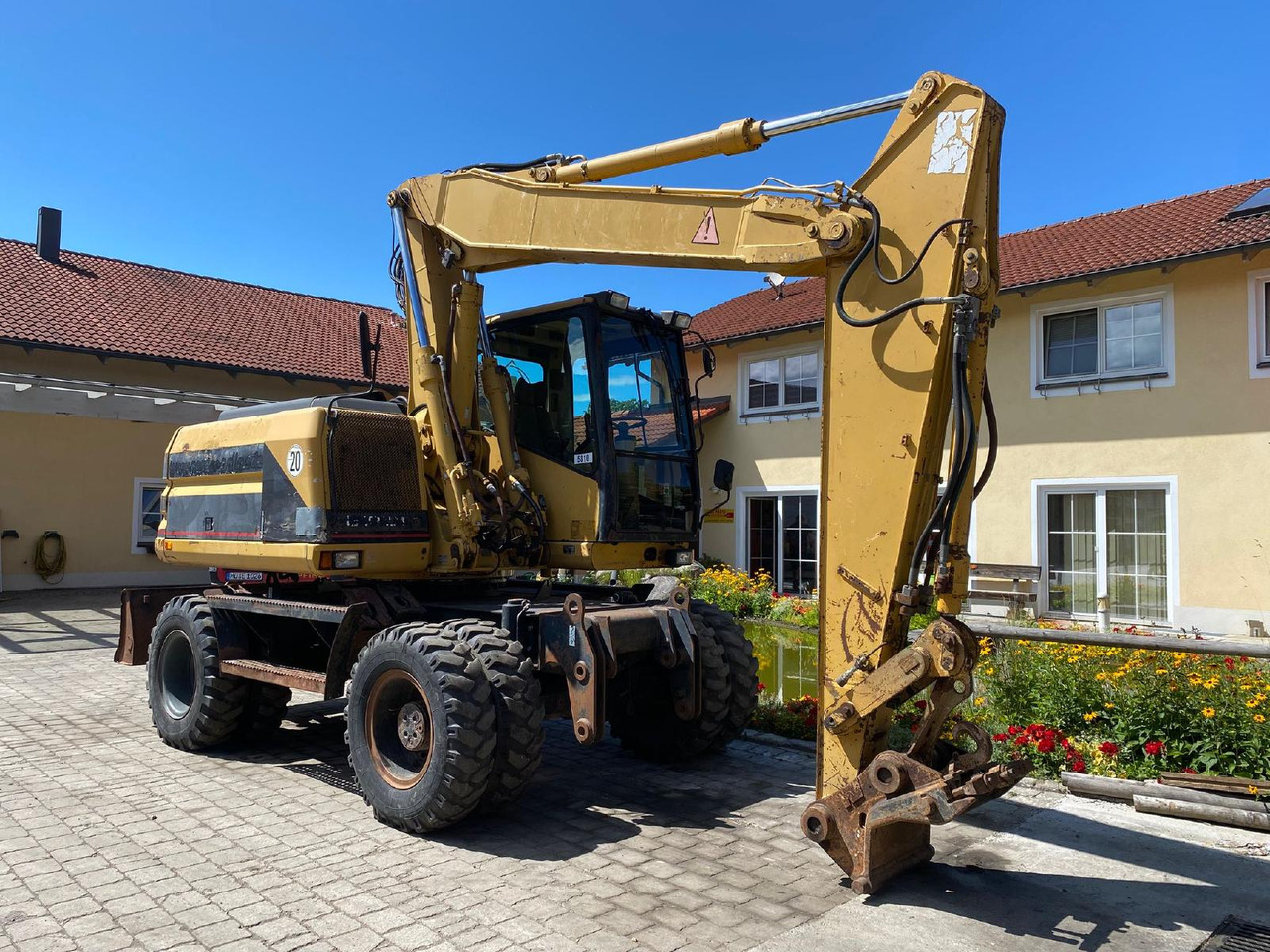 Caterpillar M 312 - Bager na kolesih: slika 1 Caterpillar M 312 - Bager na kolesih: slika 1