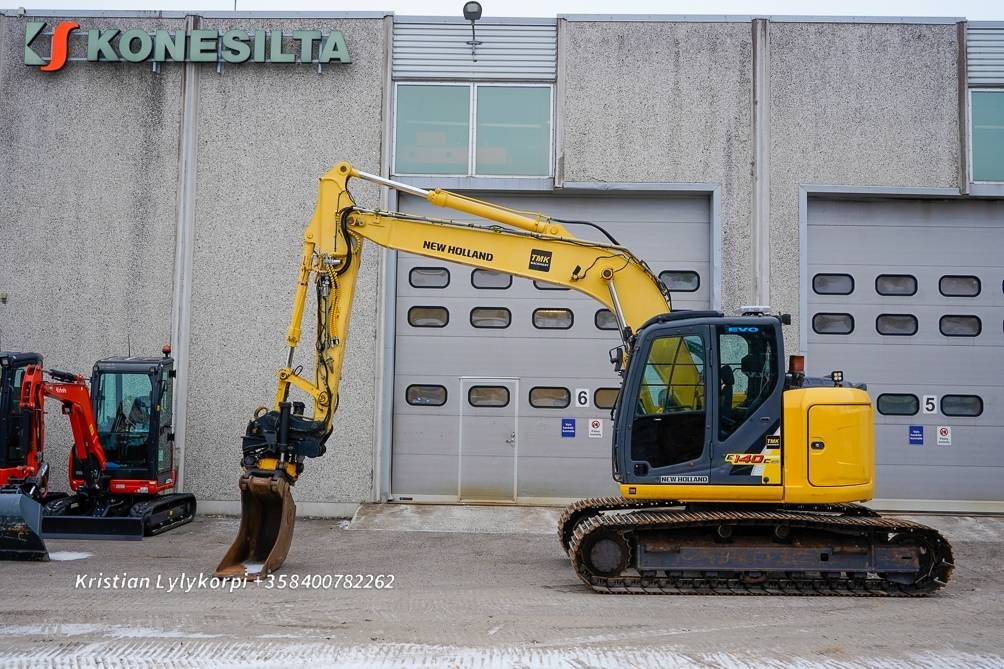 New Holland E140CSR PYÖRITTÄJÄLLÄ - Bager goseničar: slika 1 New Holland E140CSR PYÖRITTÄJÄLLÄ - Bager goseničar: slika 1