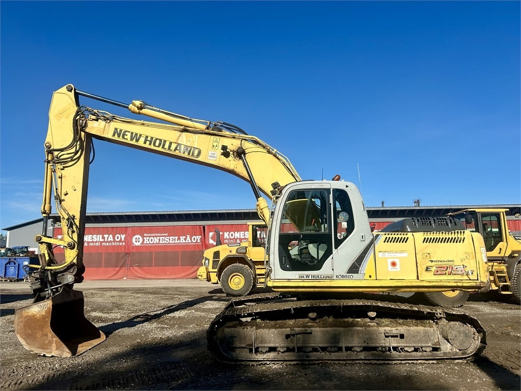 New Holland MYYTY! SOLD! E215B KAUHALLA - Bager goseničar: slika 1 New Holland MYYTY! SOLD! E215B KAUHALLA - Bager goseničar: slika 1