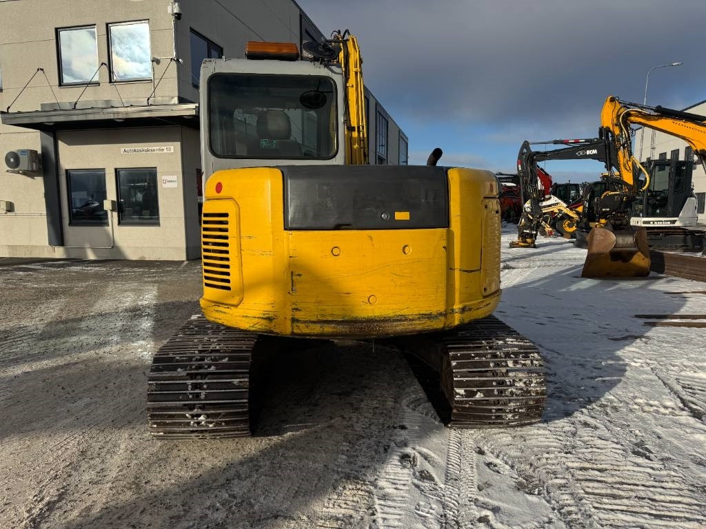 New Holland MYYTY! SOLD! E80MSR PYÖRITTÄJÄLLÄ - Mini bager: slika 4 New Holland MYYTY! SOLD! E80MSR PYÖRITTÄJÄLLÄ - Mini bager: slika 4