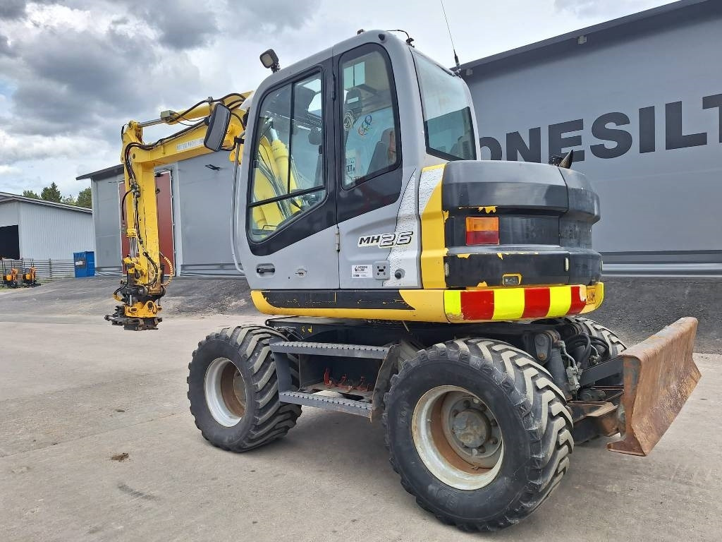 New Holland MYYTY! SOLD! MH2.6 ENGCON PIHDEILLÄ - Bager na kolesih: slika 2 New Holland MYYTY! SOLD! MH2.6 ENGCON PIHDEILLÄ - Bager na kolesih: slika 2