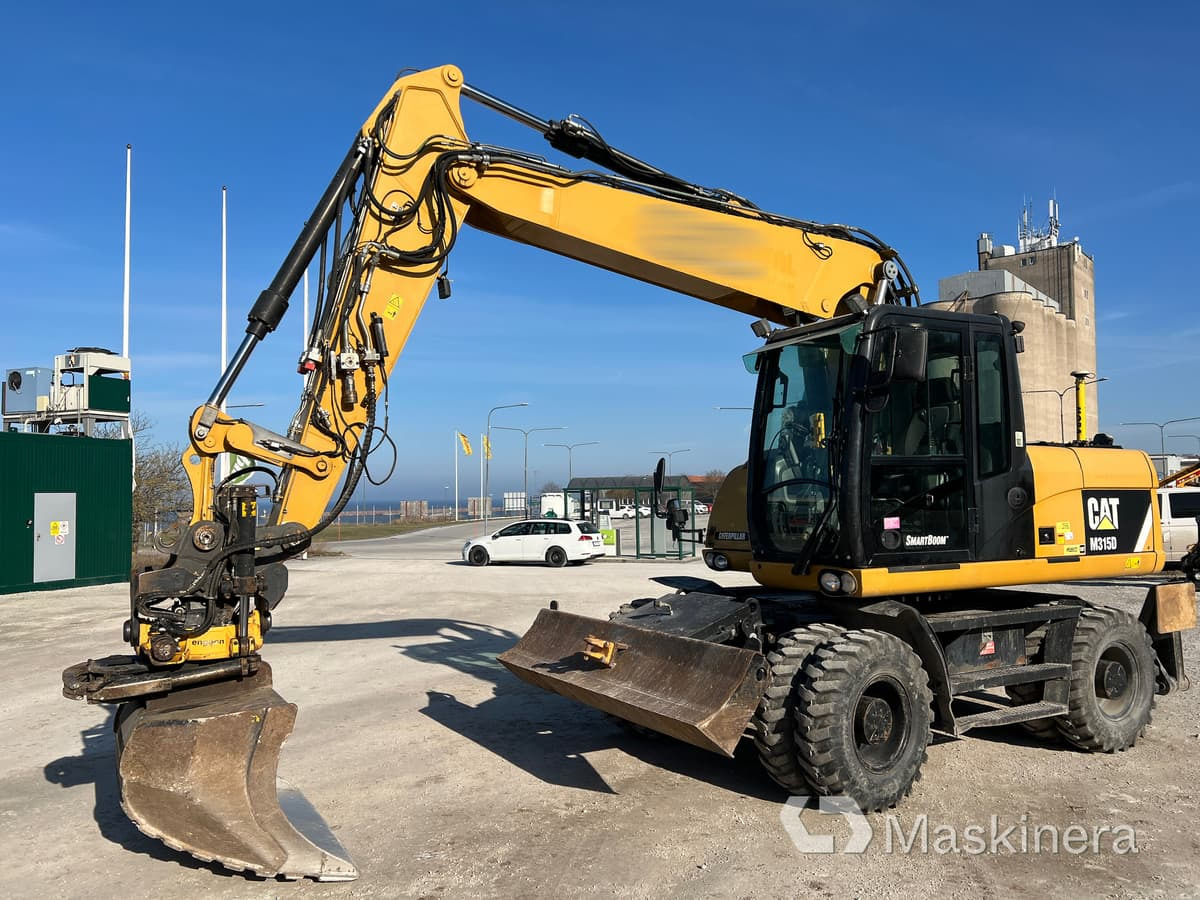 Hjulgrävare CAT 315D med tillbehör - Bager goseničar: slika 1 Hjulgrävare CAT 315D med tillbehör - Bager goseničar: slika 1