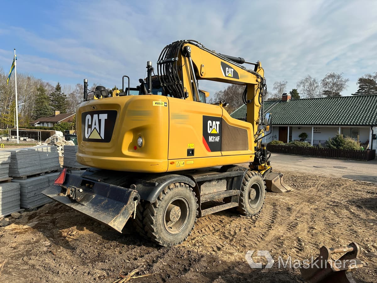 Hjulgrävare Cat M314F + redskap/vagn/grävsystem - Bager goseničar: slika 2 Hjulgrävare Cat M314F + redskap/vagn/grävsystem - Bager goseničar: slika 2