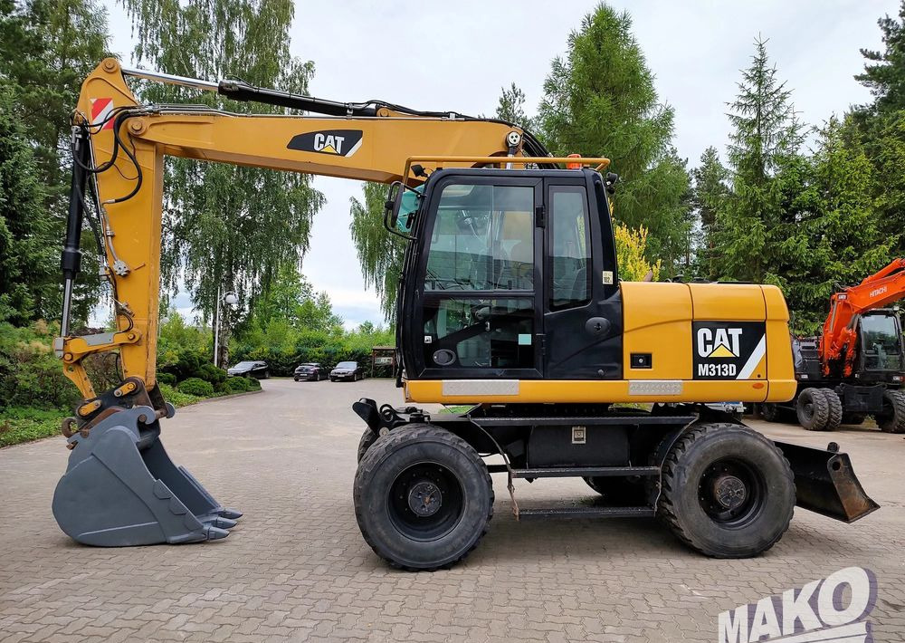 Caterpillar M313D - Bager na kolesih: slika 1 Caterpillar M313D - Bager na kolesih: slika 1