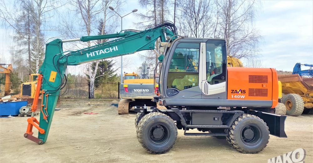 Hitachi ZX140W-3 - Bager na kolesih: slika 1 Hitachi ZX140W-3 - Bager na kolesih: slika 1
