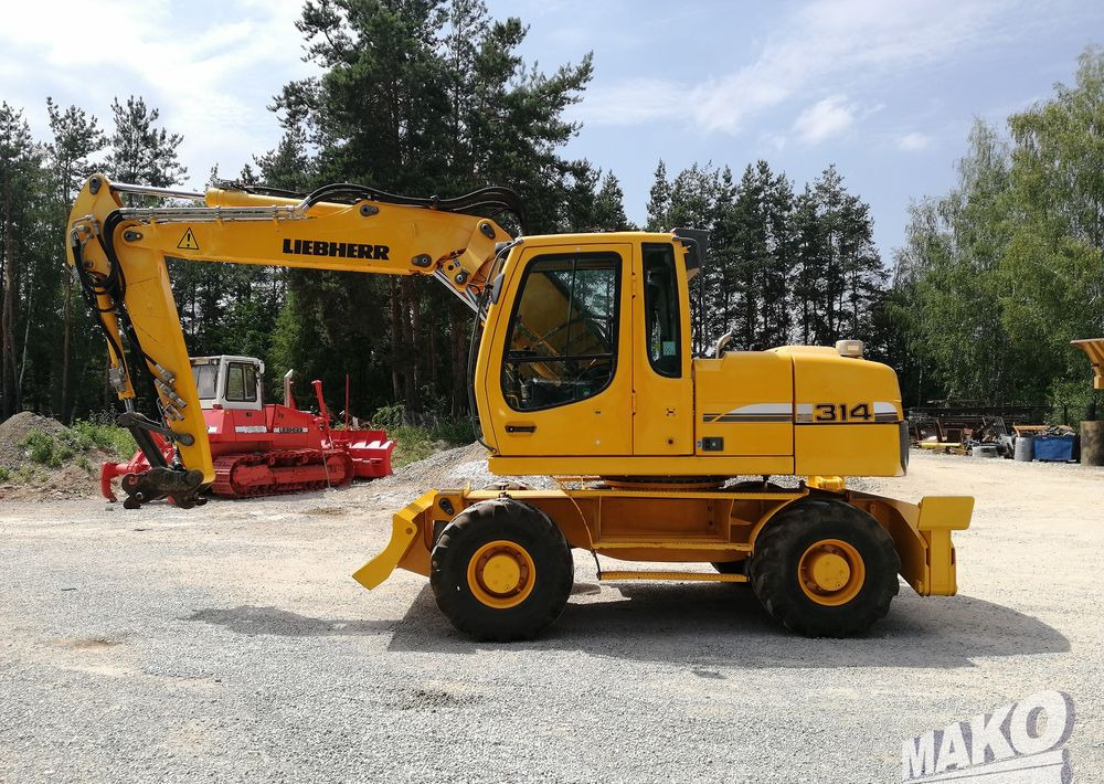 Liebherr A 314 Litronic - Bager na kolesih: slika 2 Liebherr A 314 Litronic - Bager na kolesih: slika 2
