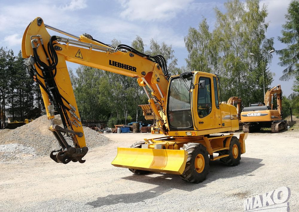 Liebherr A 314 Litronic - Bager na kolesih: slika 1 Liebherr A 314 Litronic - Bager na kolesih: slika 1