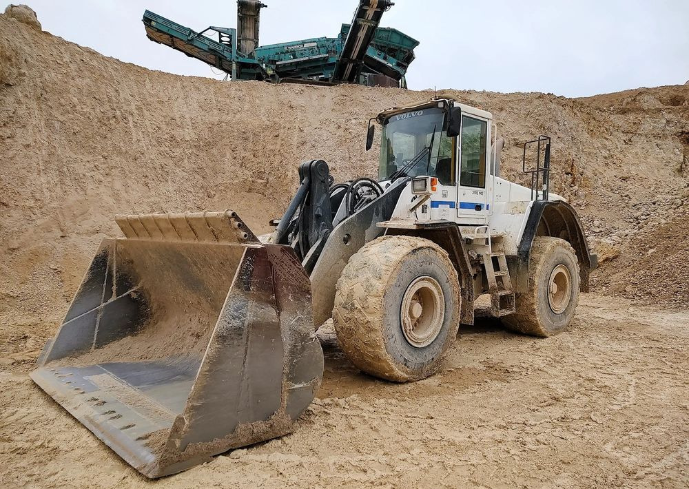 Volvo L180E - Kolesni nakladalec: slika 1 Volvo L180E - Kolesni nakladalec: slika 1