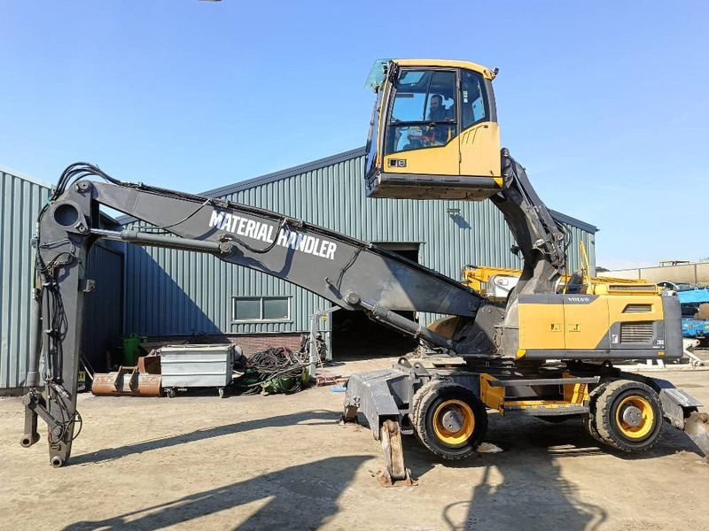 Volvo EW 210 D waste industry handler 25ton umslagbagger - Bager za prekladanje primarnih/ Sekundarnih surovin: slika 1 Volvo EW 210 D waste industry handler 25ton umslagbagger - Bager za prekladanje primarnih/ Sekundarnih surovin: slika 1
