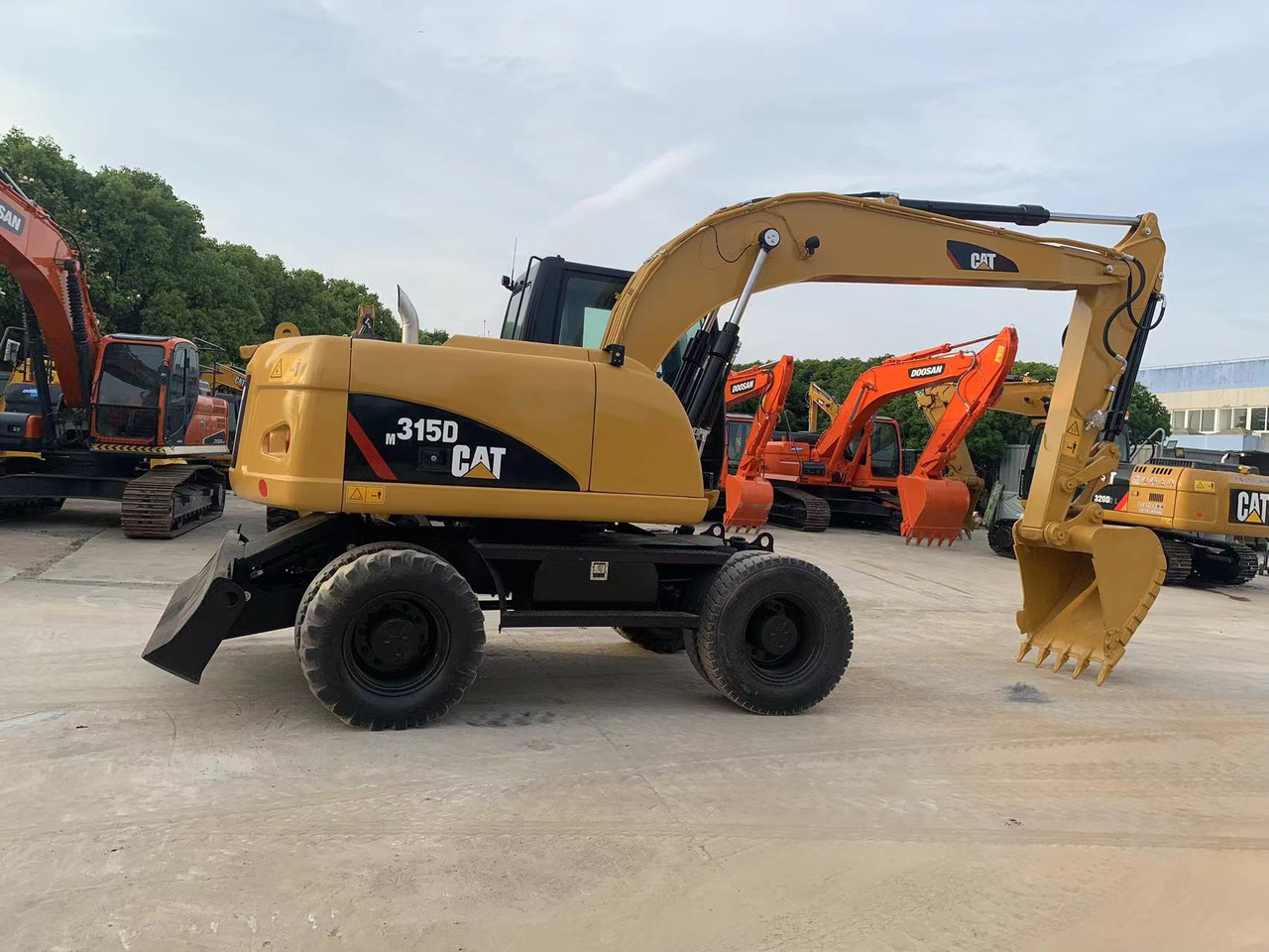 Caterpillar M315D Wheel Excavator Moving by Tires - Bager na kolesih: slika 3 Caterpillar M315D Wheel Excavator Moving by Tires - Bager na kolesih: slika 3