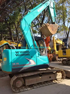 Second Hand Mini Hydraulic Excavator Kobelco Sk75 Excavator with Blade for Sale - Bager goseničar: slika 1 Second Hand Mini Hydraulic Excavator Kobelco Sk75 Excavator with Blade for Sale - Bager goseničar: slika 1