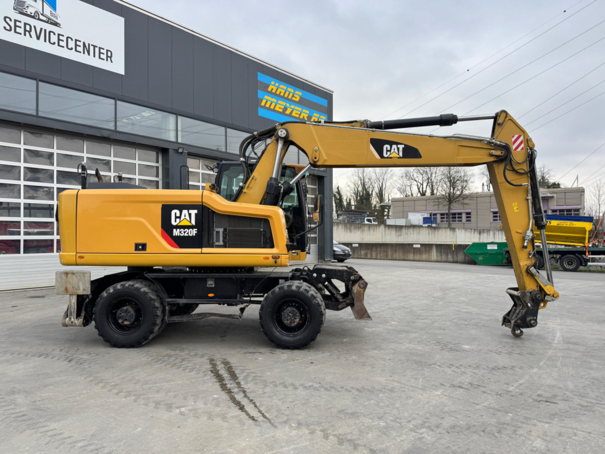 CATERPILLAR M320F Oilquick - Bager na kolesih: slika 3 CATERPILLAR M320F Oilquick - Bager na kolesih: slika 3