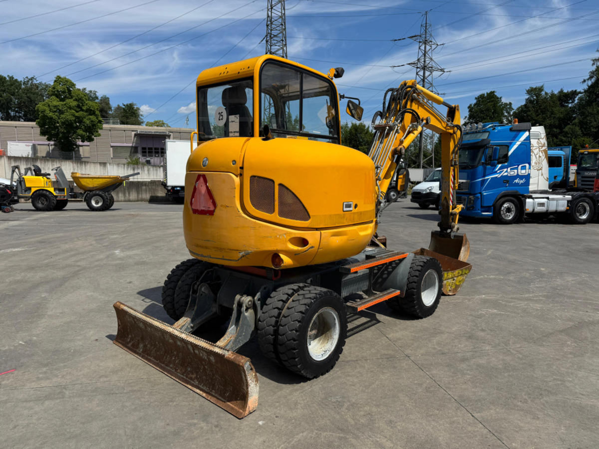 NEUSON 6503 4x Schaufeln - Bager na kolesih: slika 4 NEUSON 6503 4x Schaufeln - Bager na kolesih: slika 4