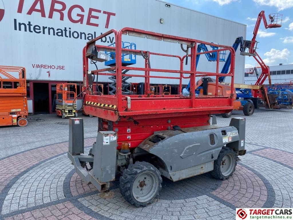 Haulotte Compact 12DX Diesel 4x4 Scissor Work Lift 1206cm - Škarjasta dvižna ploščad: slika 1 Haulotte Compact 12DX Diesel 4x4 Scissor Work Lift 1206cm - Škarjasta dvižna ploščad: slika 1