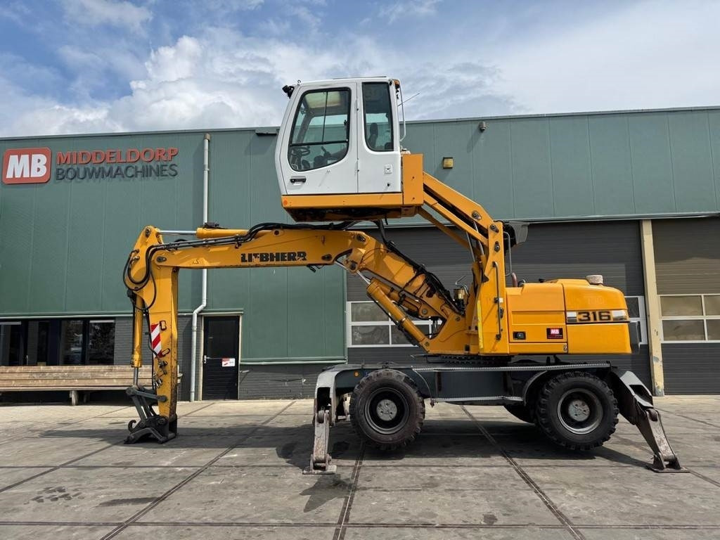 Liebherr A 316 - Bager za prekladanje primarnih/ Sekundarnih surovin: slika 1 Liebherr A 316 - Bager za prekladanje primarnih/ Sekundarnih surovin: slika 1