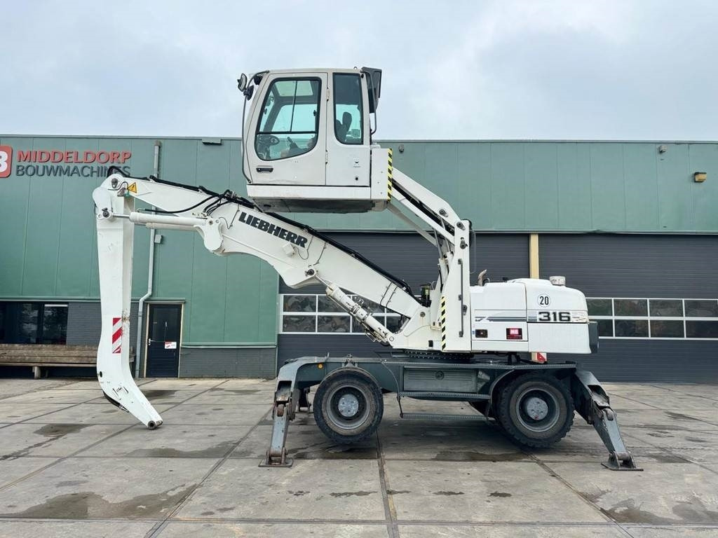 Liebherr A 316 - Bager za prekladanje primarnih/ Sekundarnih surovin: slika 1 Liebherr A 316 - Bager za prekladanje primarnih/ Sekundarnih surovin: slika 1