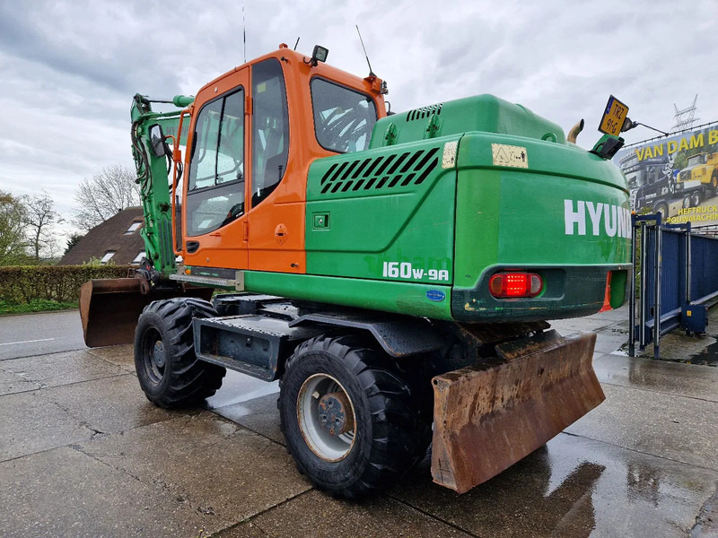 Hyundai Robex 160W-9A met 6-cilinder Cummins motor - Bager na kolesih: slika 1 Hyundai Robex 160W-9A met 6-cilinder Cummins motor - Bager na kolesih: slika 1