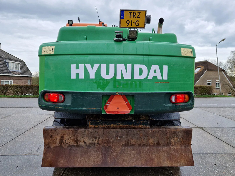 Hyundai Robex 160W-9A met 6-cilinder Cummins motor - Bager na kolesih: slika 3 Hyundai Robex 160W-9A met 6-cilinder Cummins motor - Bager na kolesih: slika 3