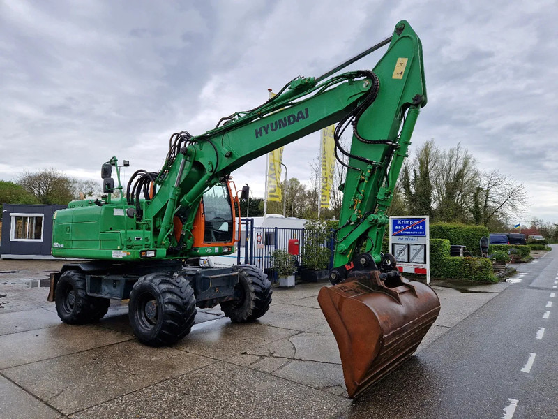 Hyundai Robex 160W-9A met 6-cilinder Cummins motor - Bager na kolesih: slika 3 Hyundai Robex 160W-9A met 6-cilinder Cummins motor - Bager na kolesih: slika 3