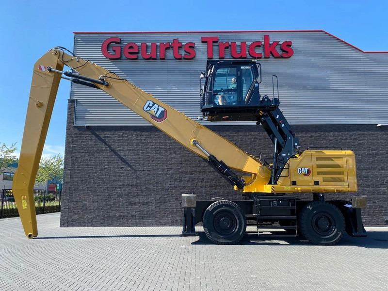 Caterpillar MH3040 NEW MATERIAL HANDLER/UMSCHLAGBAGGER/OVERSLAGKRAAN - Bager za prekladanje primarnih/ Sekundarnih surovin: slika 1 Caterpillar MH3040 NEW MATERIAL HANDLER/UMSCHLAGBAGGER/OVERSLAGKRAAN - Bager za prekladanje primarnih/ Sekundarnih surovin: slika 1