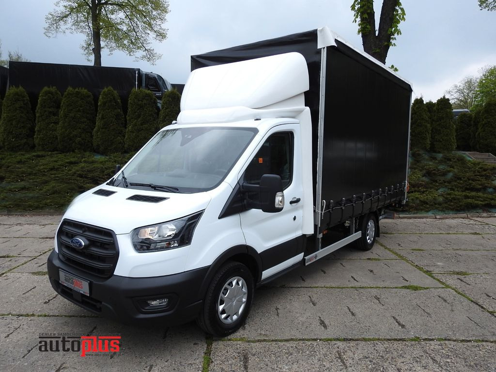 Ford TRANSIT PRITSCHE PLANE 8 PALLETS AUFZUG A/C - Dostavno vozilo s ponjavo: slika 1 Ford TRANSIT PRITSCHE PLANE 8 PALLETS AUFZUG A/C - Dostavno vozilo s ponjavo: slika 1