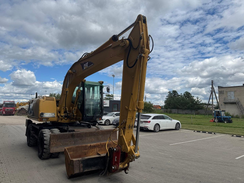 Caterpillar M 315 C - Bager na kolesih: slika 2 Caterpillar M 315 C - Bager na kolesih: slika 2