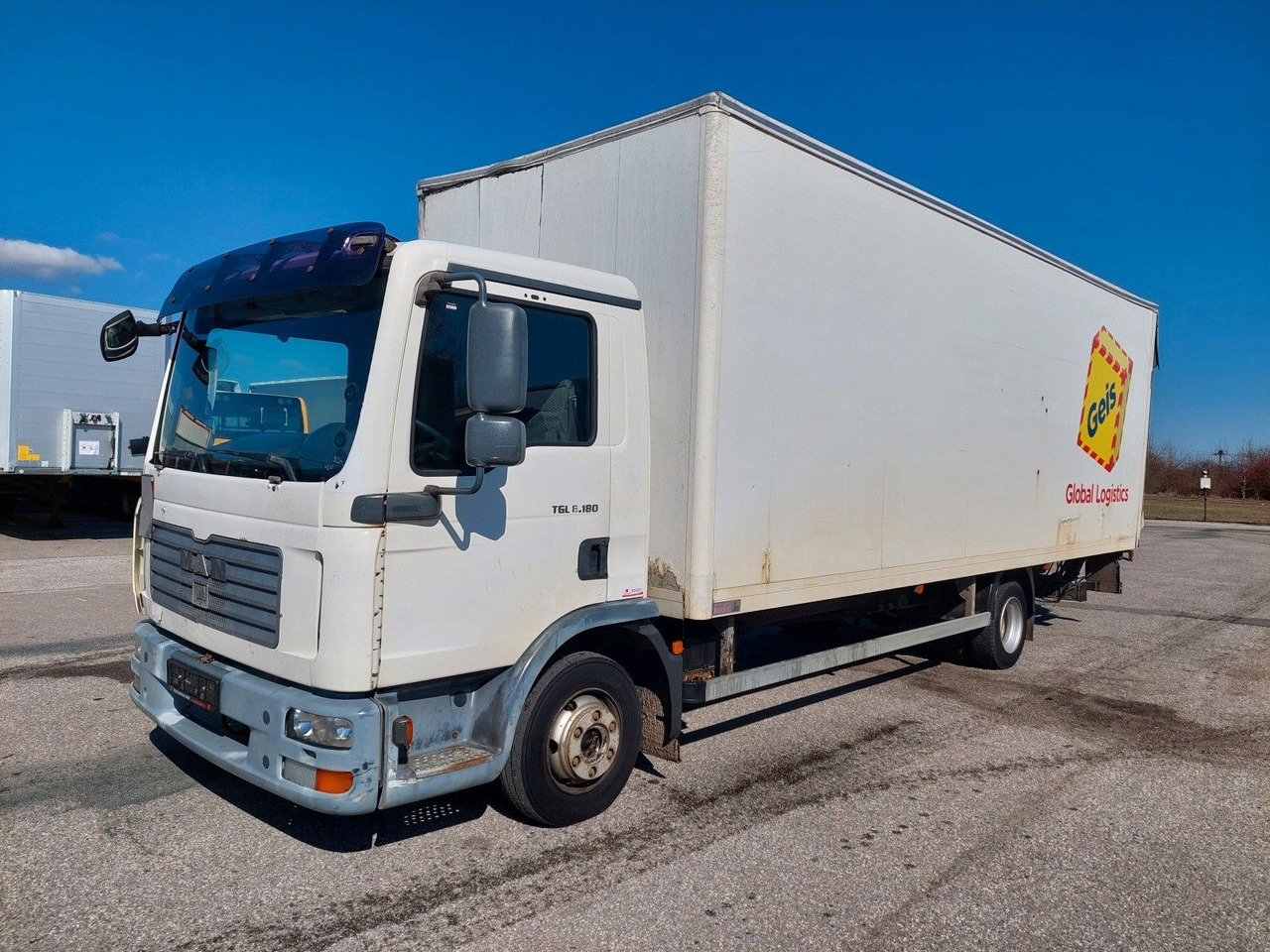 MAN TGL 7.180 4X2 BL - Dostavno vozilo z zabojnikom: slika 1 MAN TGL 7.180 4X2 BL - Dostavno vozilo z zabojnikom: slika 1