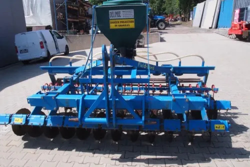 Agregat uprawowo-siewny Rabe Werk 2011 3m brona talerzowa z siewnikiem do poplonów - Sejalni kombajn: slika 4 Agregat uprawowo-siewny Rabe Werk 2011 3m brona talerzowa z siewnikiem do poplonów - Sejalni kombajn: slika 4