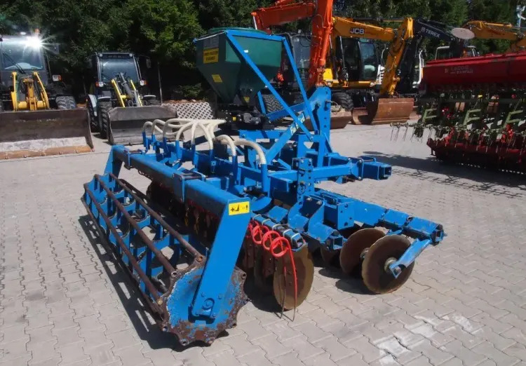 Agregat uprawowo-siewny Rabe Werk 2011 3m brona talerzowa z siewnikiem do poplonów - Sejalni kombajn: slika 5 Agregat uprawowo-siewny Rabe Werk 2011 3m brona talerzowa z siewnikiem do poplonów - Sejalni kombajn: slika 5