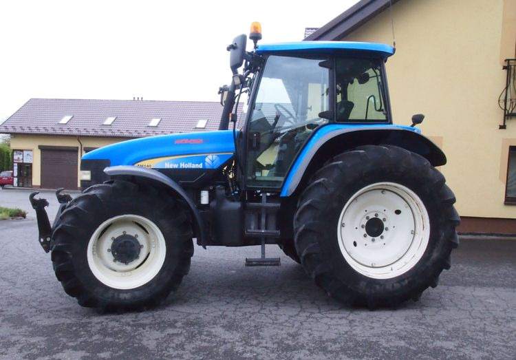 Ciągnik New Holland TM 140 2004 Przedni TUZ - Traktor: slika 5 Ciągnik New Holland TM 140 2004 Przedni TUZ - Traktor: slika 5