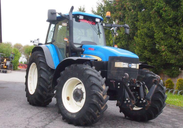 Ciągnik New Holland TM 140 2004 Przedni TUZ - Traktor: slika 2 Ciągnik New Holland TM 140 2004 Przedni TUZ - Traktor: slika 2
