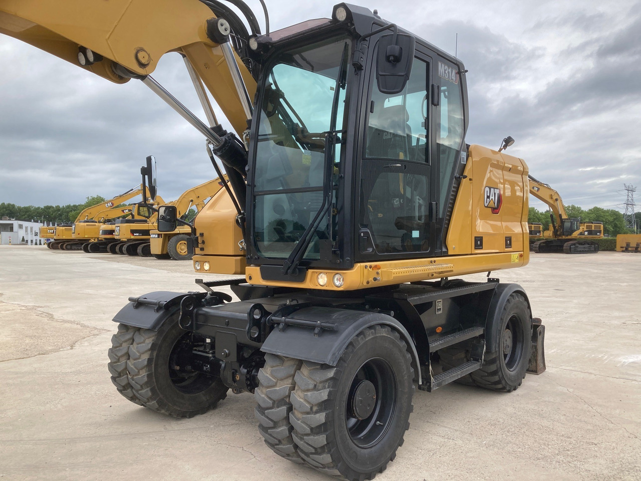 CATERPILLAR M314 - Bager na kolesih: slika 2 CATERPILLAR M314 - Bager na kolesih: slika 2