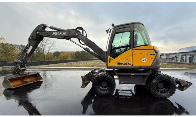 Mecalac 714 MW - Bager na kolesih: slika 1 Mecalac 714 MW - Bager na kolesih: slika 1