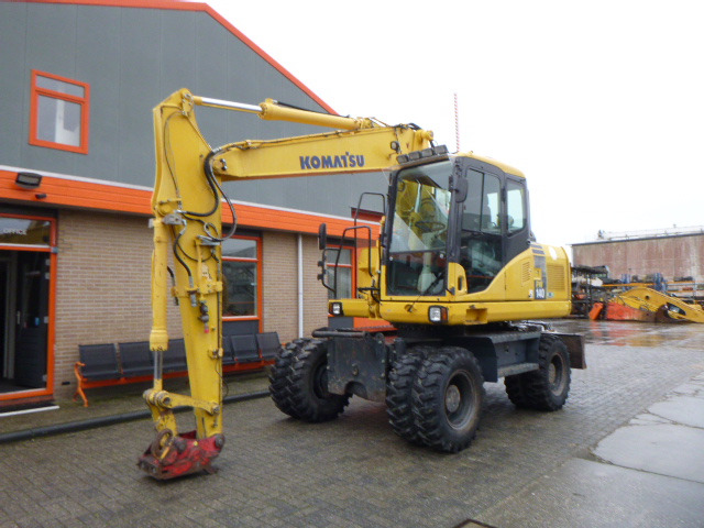KOMATSU PW140-7 - Bager na kolesih: slika 1 KOMATSU PW140-7 - Bager na kolesih: slika 1