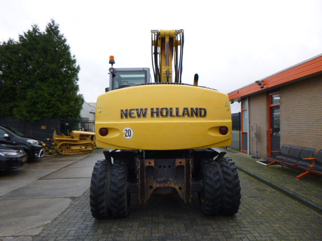 NEW HOLLAND MH PLUS - Bager na kolesih: slika 4 NEW HOLLAND MH PLUS - Bager na kolesih: slika 4